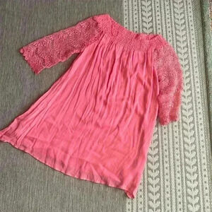 Peachy pink muslin and lace style dress